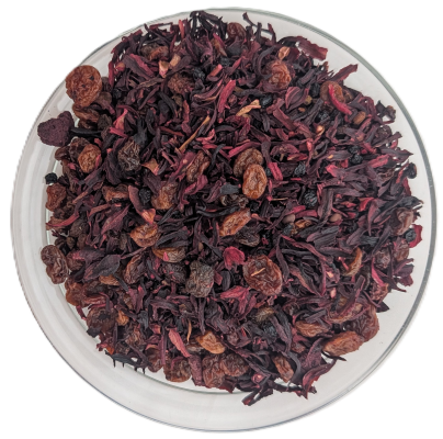 Bio-Früchteteemischung Bio Waldkobold mit dunklen Hibiskusblüten, saftigen Rosinen und getrockneten Waldbeeren.